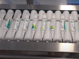 Syringe Labelling with Extended Infeed