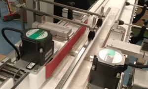 Base Labelling - with Dual Side Holding Belts Thermoformed Trays