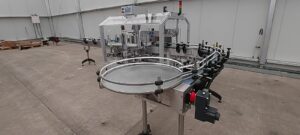 ALline with Return Conveyor for Barcode and Promo Labelling